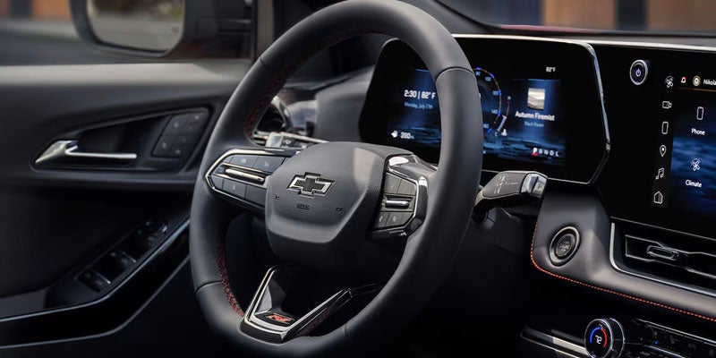 Chevrolet steering wheel and digital infotainment display.